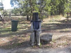 The postie had better only bring good news with Ned Kelly waiting for him.