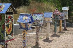 Mosaic Letterboxes created from the Black Saturday Fires of 2009 - by Sandi Kogtevs